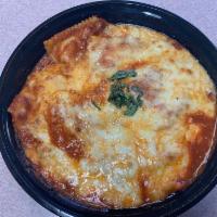 Baked Ravioli · Served with mozzarella cheese. Served with salad and garlic knots.