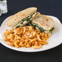 Pesto Panini · Chicken, spinach, tomatoes in our pesto mayonnaise. Served with homemade bread and fries.