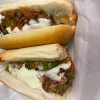 Nino's Cheese Steak Sandwich · Green peppers, mushrooms, fried onions, pepperoni and sauce.