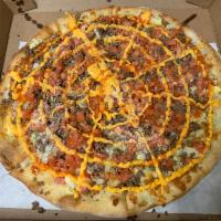 Taco Pizza · Ground beef, tomatoes, lettuce, cheddar cheese and hot sauce.