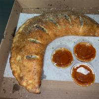 Supreme Stromboli · Green peppers, onions, mushrooms, sausage, pepperoni and cheese. Served with sauce on the si...