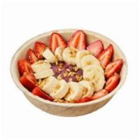Acai - Classic Bowl · Base: Amazonian acai, banana. Toppings: Almond granola, banana, strawberries, coconut flakes.