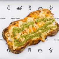Cheesy Bite · Whole wheat flat bread topped with vegan mozzarella, vegan Parmesano (N), pesto de cilantro ...