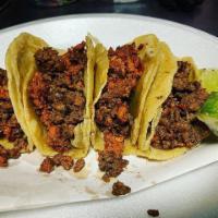 ChoriBis (Chorizo Y Bistec) · Four savory tacos with both beefsteak and chorizo mixed together! All orders come with a sid...