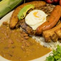 Bandeja Tipica Colombiana · Steak with sausage, fried pork belly, rice, beans, avocado, fried sweet plantain and fried e...
