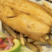 Trucha Frita · Trout fried with rice, fries and salad.