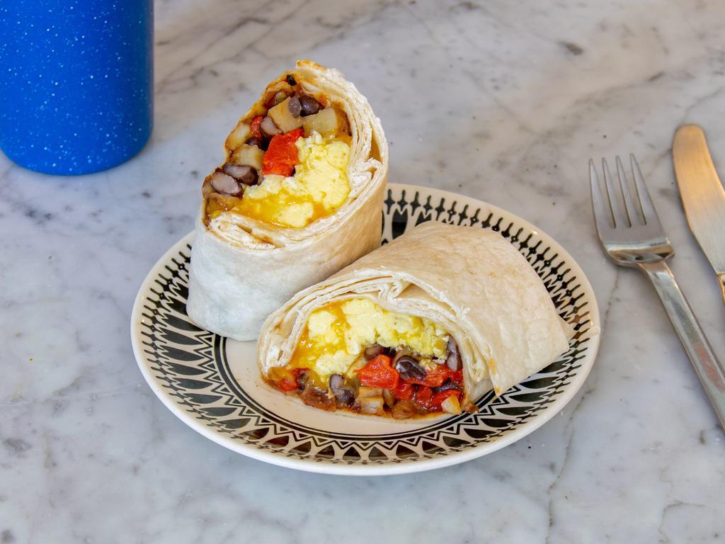 Vegetarian Breakfast Burrito · Flour tortilla, scrambled free range eggs, potatoes, black beans, roasted red peppers, chipotle adobo sauce, cheddar cheese.