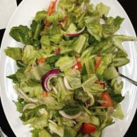 House Salad · Seasonal mix greens, tomatoes, cucumber olives & red onions