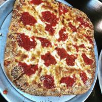 Grandma Slice ·  A margarita pizza, on a crust that is similar to Sicilian pizza.