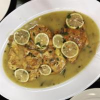 Veal Francese · Flour-dredged, egg-dipped, sautéed veal with a lemon-butter and white wine sauce