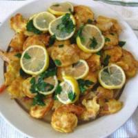 Shrimp Francese · Flour-dredged, egg-dipped, sautéed shrimp with a lemon-butter and white wine sauce