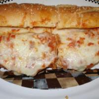 Chicken Cutlet Parmigiana Hero · breaded chicken cutlets covered in tomato sauce and mozzarella and parmesan cheese
