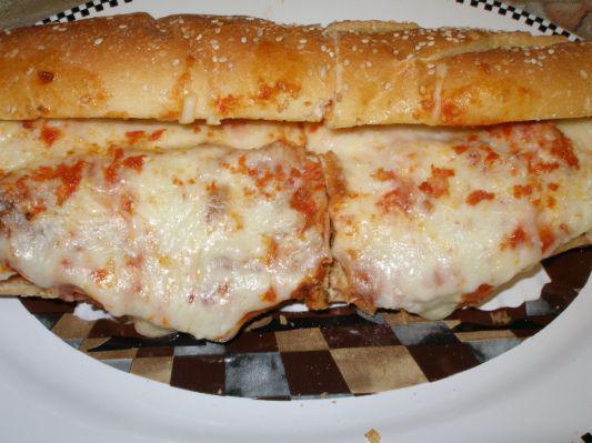 Chicken Cutlet Parmigiana Hero · breaded chicken cutlets covered in tomato sauce and mozzarella and parmesan cheese