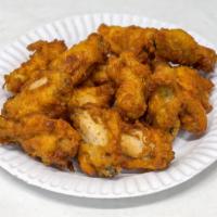 12 Pieces Chicken Wings · Small breaded chicken wings deep fried
