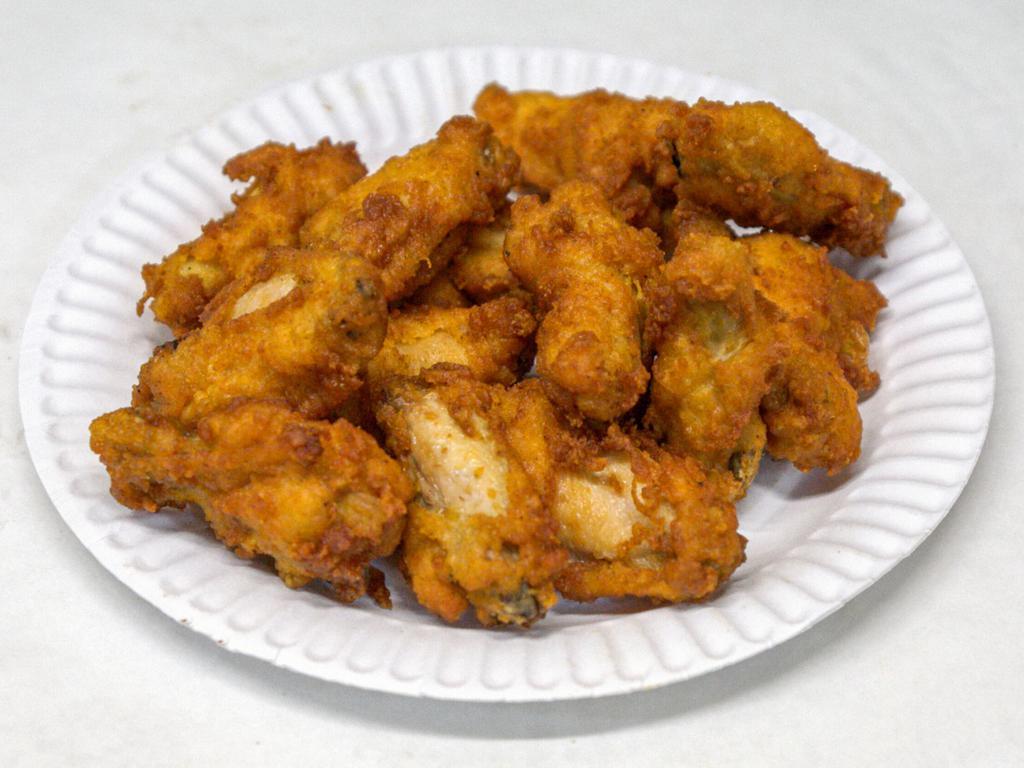 12 Pieces Chicken Wings · Small breaded chicken wings deep fried