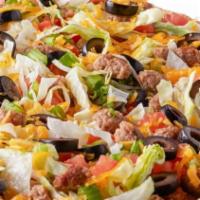 Beef Taco Pizza · Taco sauce on our original crust, topped with cheddar and mozzarella cheeses, beef, lettuce,...