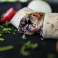 Fajita Burrito · Choice of protein, choice of beans, rice, thinly sliced grilled chilies, peppers and onions,...