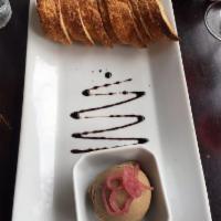Chicken Liver Pate · House made pate topped with red onion confit and served with toast points.