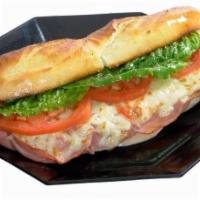 Roma Italiano Sub · Pepperoni, salami, ham, cheese, lettuce and tomatoes. Baked with cheese. 