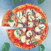 Classic Margherita · Our homemade margherita sauce with fresh Mozzarella cheese and topped with fresh basil and p...