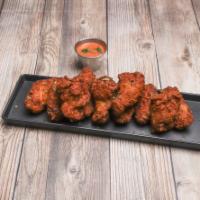 Breaded Wing Dings · Breaded Buffalo wings with your favorite sauce on the side.