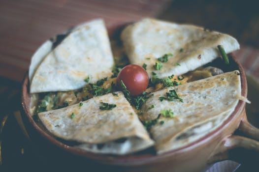 Chicken Quesadilla · Cooked tortilla that is filled with cheese and folded in half with chicken. 