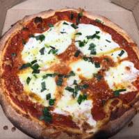 Margherita Pizza · Tomato sauce, fresh mozzarella, Parmesan cheese, fresh basil, and extra virgin olive oil. Th...