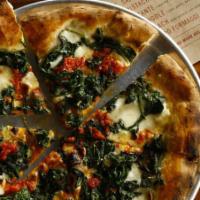 Chicken Italiano White Pizza · Grilled chicken, roasted peppers, spinach, olive oil and garlic.
