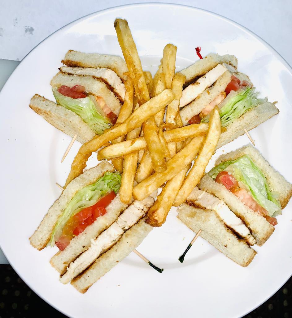 Grilled Chicken Breast Club Sandwich · With lettuce and tomato. Served with french fries. cheese