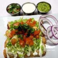 Chicken Flautas 4pcs · Served with rice and beans.
Lettuces tomatoes cilantro cheese 
sour cream 