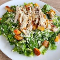Caesar Salad · Mixed crisp romaine, Asiago, garlic croutons, house Caesar dressing.