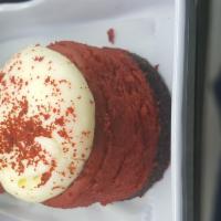 Red Velvet Cheesecake · Chocolate crumb crust / Red velvet cheesecake with cream cheese frosting and red velvet cupc...