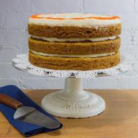 Carrot Cake · Made with fresh carrots, apples, and pecans, frosted with cream cheese frosting (iced in bet...