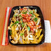 Bulgogi Fries · Crispy fries topped with our shaved bulgogi beef, spicy mayo, kimchi and green onion