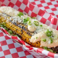 Elote · Brushed with a mayo, lime juice, and paprika sauce. Topped with scallions, cilantro and coti...