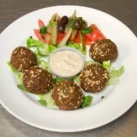 5 Pieces of Falafel · Chicken peas with minced parsley and onions, deep-fried, served with tahini.