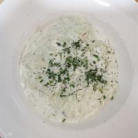 Cucumber Salad · Cucumber salad with yogurt-dill dressing.