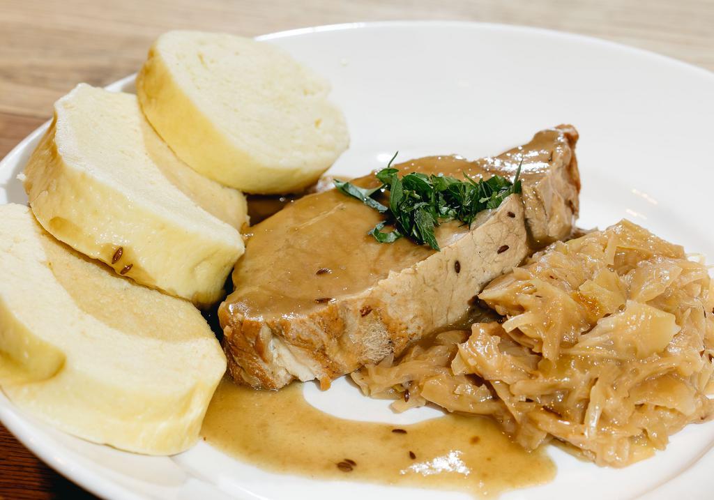 Roast Pork · Braised pork loin with sauerkraut and bread dumplings.