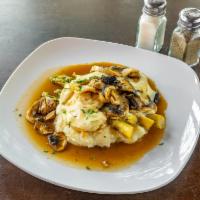 Chicken Madeira · Chicken breast with fresh mushrooms in a Madeira wine sauce served over mashed potatoes and ...
