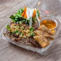 Grilled Pork and Egg Rolls Vermicelli Noodles Lunch Box · Bun thit nuong, cha gio. Chopped lettuce, mints, bean sprout, pickled daikon and carrot, and...