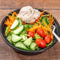 Chicken Salad · green salad topped with shredded carrots, grape tomatoes, sliced cucumbers, and a scoop of o...