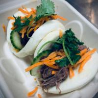 BONMi Bao · Two fluffy baos filled with choice of pulled pork, tofu, BBQ pork belly (+$1), or 18 hour be...
