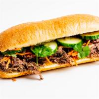 BON Red Eye Banh Mi Sandwich · Asian BBQ 18 hour beef, cucumbers, pickled onion & carrot, spicy mayo and cilantro on a cris...