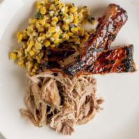 PnC Double Trouble (Pulled Pork & 2 Ribs) · Pulled pork & two ribs served with your choice of two sides.
