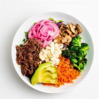 DGB Paleo Bowl · 18 hour beef, kale, white cabbage, avocado, roasted broccoli, cauliflower rice, mushrooms, s...