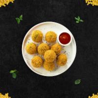 Cheesy Mac and Cheese Bites · Fried bites of melt in your mouth mac and cheese. A delicious comfort food side. 