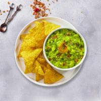 Benito's Guacamole · A heaping scoop of fresh guacamole and warm tortilla chips