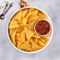 Chips ＆ Salsa Love Story · Plain chips with pico de gallo salsa on the side