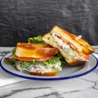 Tuna Salad Sandwich · Toasted challah bread topped with yellowfin tuna salad (which contains celery, red onion, ca...