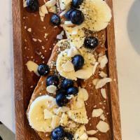 Almond Banana Berry Toast · Almond butter, banana, blueberry, hemp seed, almond seeds